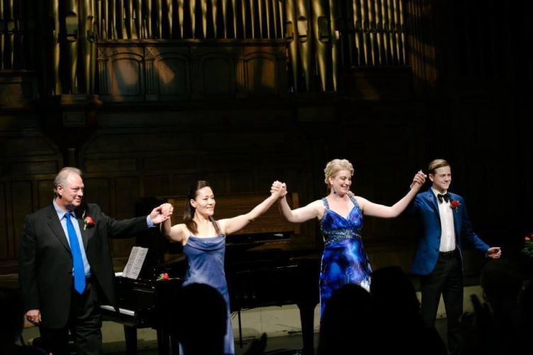 Maria Drost and some of her students are bowing after a performance to Showcase her Voice Academy and her Singing Lessons Online